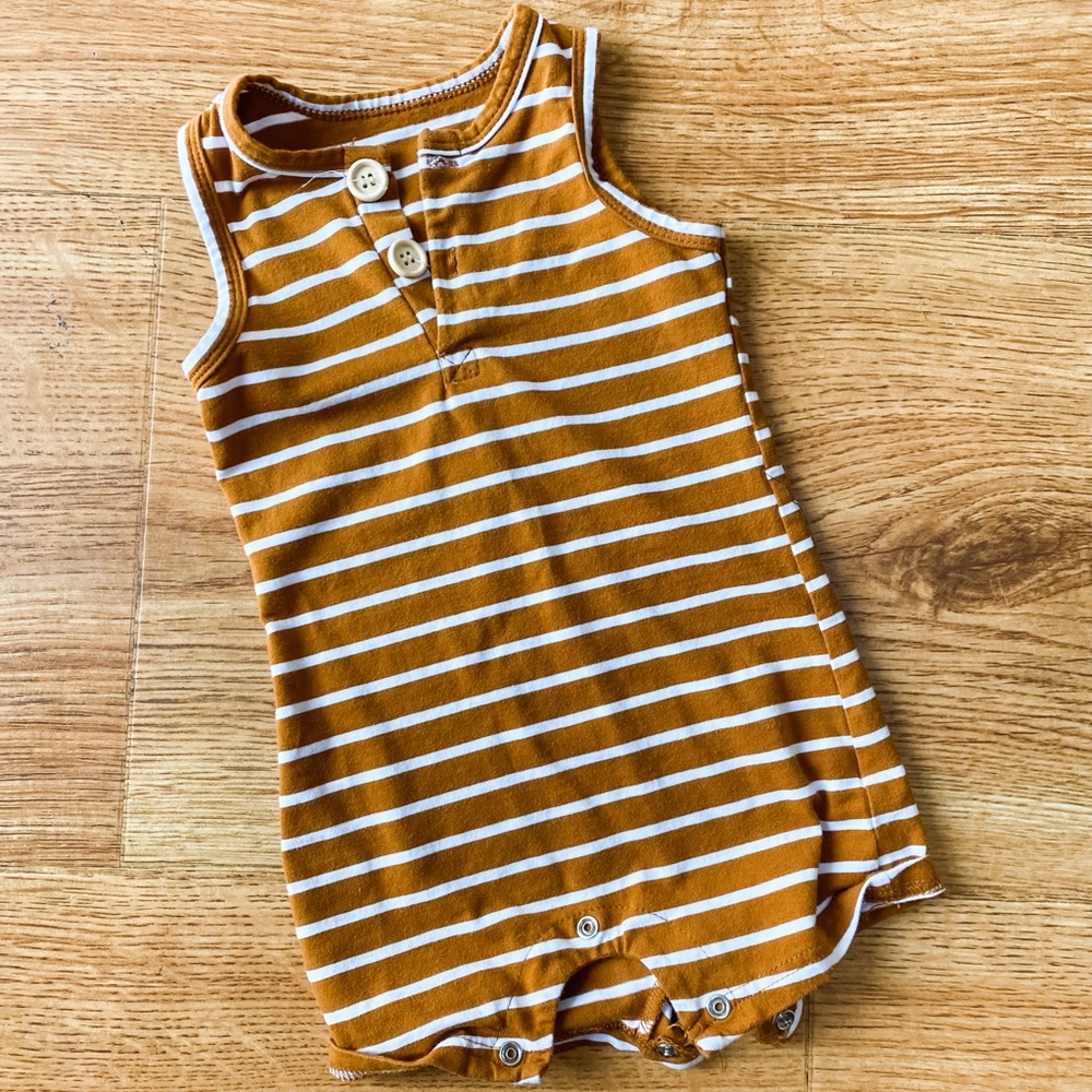 Adorable romper. Unisex. Snap bottom.